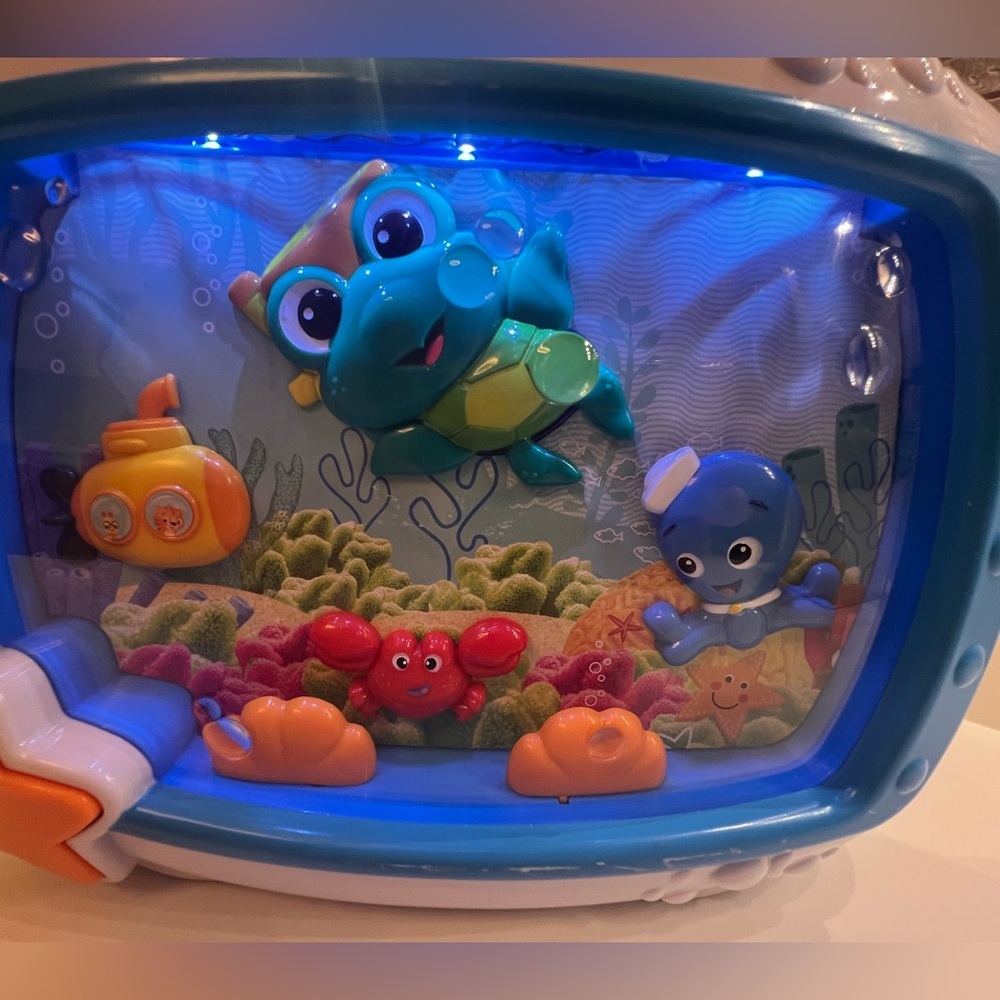 BABY EINSTEIN OCEAN ADVENTURE TOY. GREAT CONDITION.  SOUND IS VERY GOOD.